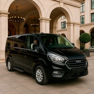 Private Faro Airport transfer to Tavira in black Ford Tourneo van